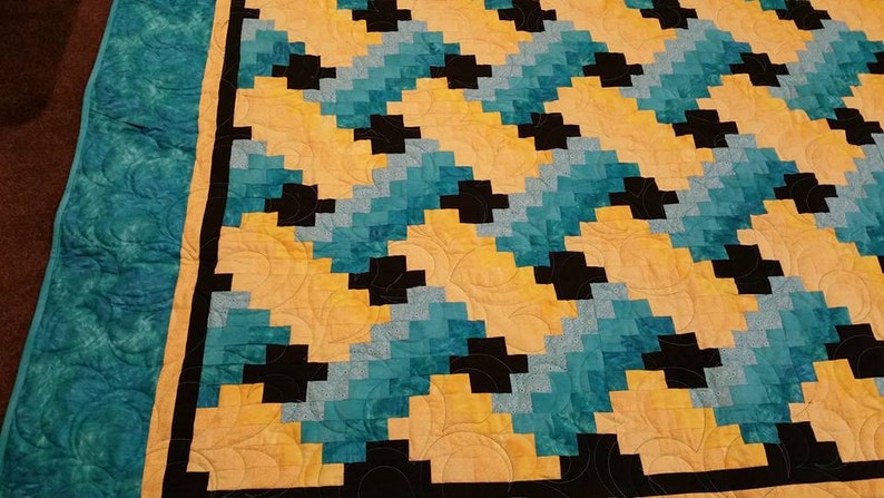 Tourquoise and Yellow Weaver Fever Twin Quilt