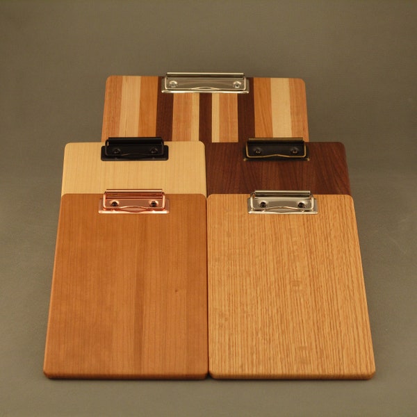 Hand-crafted smaller wooden clipboards from Ohio walnut, cherry, oak & maple. Available with  handsome traditional or low profile clips.