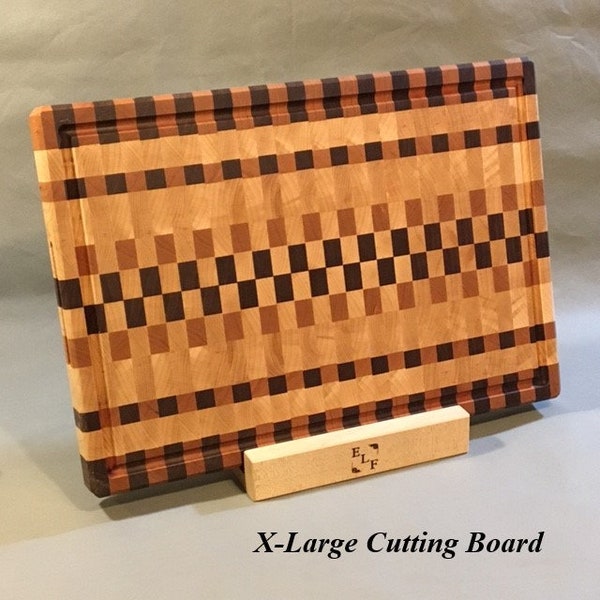 End Grain Cutting Board / Butcher Block. Created from hard maple, black walnut and rich cherry. Four sizes with options.