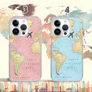 May include: Two clear phone cases with a world map design. The case on the left is pink and the case on the right is blue. Both cases have a small airplane icon in the upper right corner. The text "SOUTH ATLANTIC OCEAN" and "ANTARCTIC" are visible on both cases.