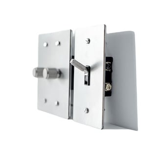 May include: A pair of brushed metal electrical switch plates. One plate has two round knobs, the other a toggle switch. Both plates are fixed with small screws and have a minimalist design. The plates are made of metal.