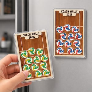 May include: Two rectangular magnets with a volleyball theme. One magnet is held by a hand. Each magnet features a volleyball court design with the text "COACH WALLY 2026". The magnets display volleyballs in green, yellow, red, and blue.