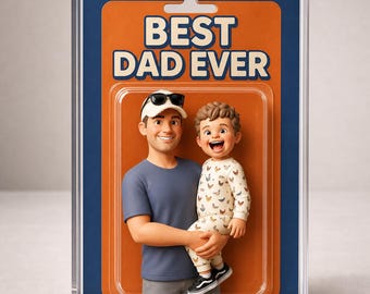 May include: A collectible action figure set in clear plastic packaging featuring a cartoon-style adult wearing a blue t-shirt and white baseball cap holding a child in a chicken-patterned outfit. The orange backing card displays the text BEST DAD EVER.