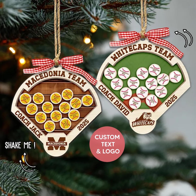 May include: Two baseball-themed Christmas ornaments. One features a wooden baseball diamond with the text "MACEDONIA TEAM" and "COACH JACK". The other says "WHITECAPS TEAM" and "COACH DAVID". Both have red and white checkered bows.