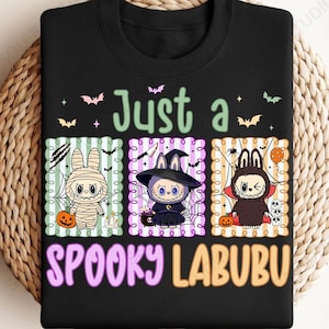 Just A Spooky Doll Monster Characters T-shirt, Halloween Cartoon Sweatshirt, Cute Scary Tee, Spooky Shirt 2025, Monster Doll Horror Shirt