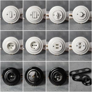 Può includere: Collezione di interruttori, prese e porte USB elettriche bianche e nere. Gli apparecchi bianchi hanno un design classico e vintage. Gli apparecchi neri hanno una finitura lucida. La collezione comprende vari stili di interruttori, prese e porte di ricarica USB.