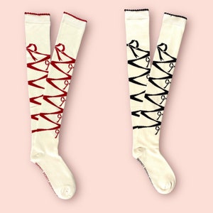 Crisscross ribbon over the knee socks