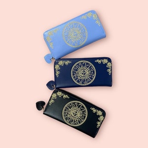 Cartera con mapa de astrología y constelaciones
