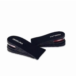 May include: Black shoe inserts with the brand name "PESELINA" printed in white. The inserts have an air cushion and are designed to increase height. The inserts are black.