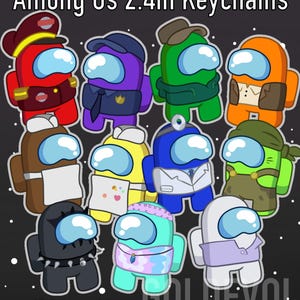 May include: A collection of eleven Among Us character keychains, each 2.4 inches tall, featuring various colors and outfits including hats, uniforms, and accessories. The text at the top reads Among Us 2.4in Keychains and at the bottom not official merch!