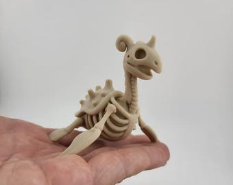 Figura estilizada de esqueleto de Lapras (fan art de Pokémon)