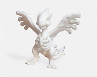 Figura estilizada de esqueleto de Lugia (fan art de Pokémon)
