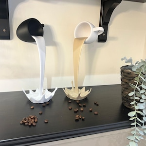 Floating Coffee Cup Sculpture – Black Mug Pouring White Liquid | Gravity-Defying Art Decor | Modern Kitchen or Coffee Bar Accent