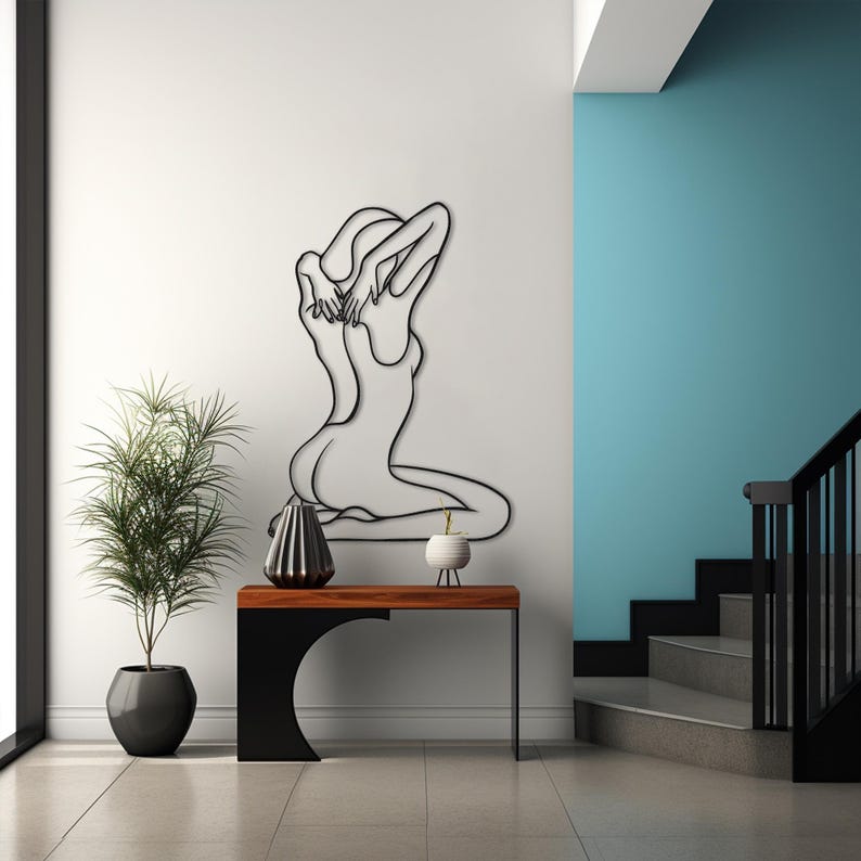 nude woman line art,
metal wall decor,
aesthetic design,
minimalist line art,
nude female wall art,
home and living,
one line art,
naked women decor,
confident woman art,
naked woman body,
above bed decor,
christmas gift,
gift for her,