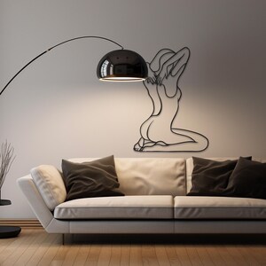 nude woman line art,
metal wall decor,
aesthetic design,
minimalist line art,
nude female wall art,
home and living,
one line art,
naked women decor,
confident woman art,
naked woman body,
above bed decor,
christmas gift,
gift for her,