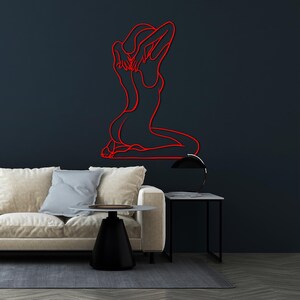 nude woman line art,
metal wall decor,
aesthetic design,
minimalist line art,
nude female wall art,
home and living,
one line art,
naked women decor,
confident woman art,
naked woman body,
above bed decor,
christmas gift,
gift for her,