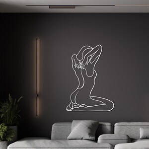 nude woman line art,
metal wall decor,
aesthetic design,
minimalist line art,
nude female wall art,
home and living,
one line art,
naked women decor,
confident woman art,
naked woman body,
above bed decor,
christmas gift,
gift for her,