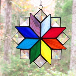 Stained Glass Quilt Suncatcher in the 8 Point Star Pattern in Rainbow Chakra Colored Glass, and Clear Bevels