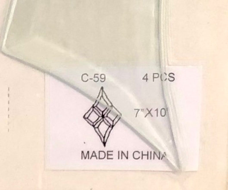 C 59-7 x 10 Beveled Glass Concave Diamond Cluster