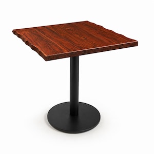 May include: A square table with a dark reddish-brown wooden top and a black metal base. The tabletop has a natural, uneven edge. The base consists of a round foot and a central column. The table is suitable for a small dining area or as a side table.