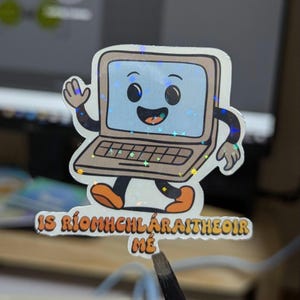 a colourful laptop sticker character waving and smiling