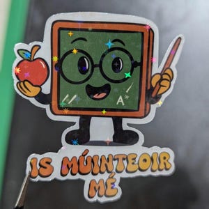 a colourful teacher sticker character holding an apple and a pointing stick. he is an old fashioned black board, he wears glasses and smiles in a friendly manner, there is an A* written on him.
