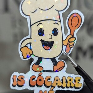 chef character holding a wooden spoon wearing a chef's hat and smiling in a friendly manner, very cute.