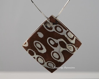 Colgante Mokume Gane: Collar convertible de cobre y plata
