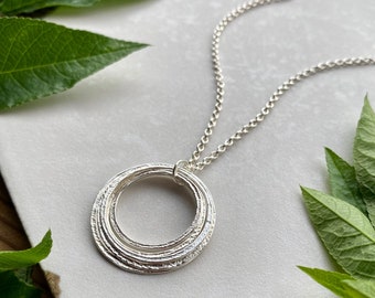 Handcrafted 70th Birthday Sterling Silver 7 Sparkly Circles Necklace, Mid Size 7 Rings for 7 Decades Milestone Jewelry, 70 Birthday Gift