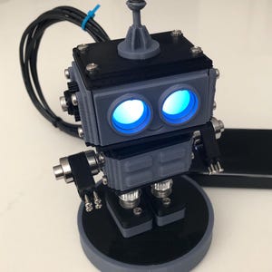 3D Printed Mini Robot: Articulated Arms, LED Eyes, Optional USB & Stand