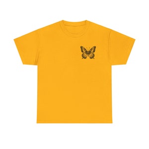 May include: A yellow short-sleeved t-shirt with a black butterfly graphic on the left chest.