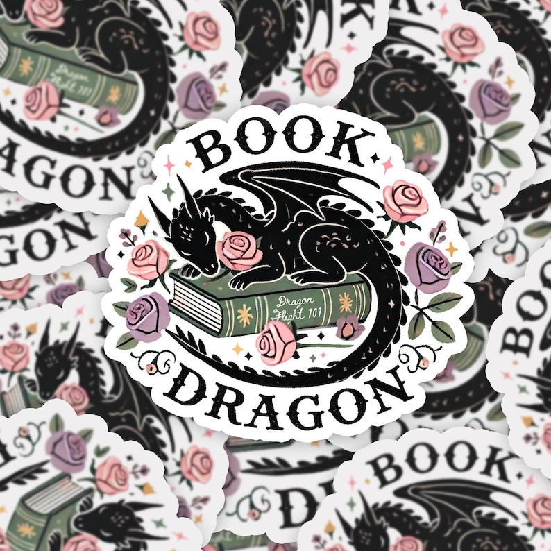 May include: A black and white sticker with a black dragon curled around a green book with the text "Dragon Flight 101". The dragon is sleeping on the book with its head resting on a pink rose. The sticker is surrounded by pink and purple roses and green leaves.
