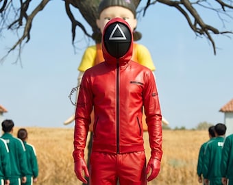 May include: A bright red hooded jacket and matching pants set featuring a black front zipper, black pocket accents, and a black mask with a white triangle symbol on the front. The outfit includes red gloves and a hood worn over the mask.