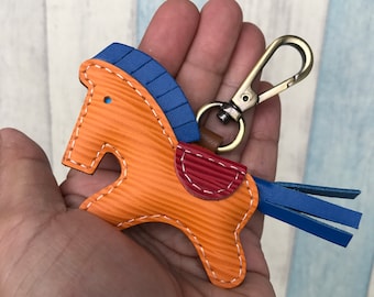 Small size - Beon the epi leather horse charm with lobster clasps version ( Orange epi with dark blue cowhide mane/tail )