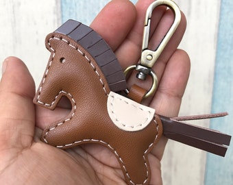 Small size - Beon the cowhide horse charm with lobster claps ( Brown with dark brown mane/tail )