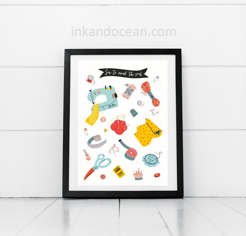 May include: A white background with a black frame around a colorful illustration of sewing supplies. The text "Sew to mend the soul" is at the top of the image.