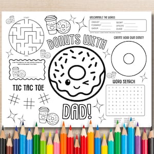 Op de afbeelding: Een wit activiteitenblad met zwarte lijntekeningen, met een donutthema. Bevat een doolhof, tic-tac-toe, een woordzoeker en een woordpuzzel. De tekst luidt "Donuts with Dad!" en "Maak je eigen donut!"