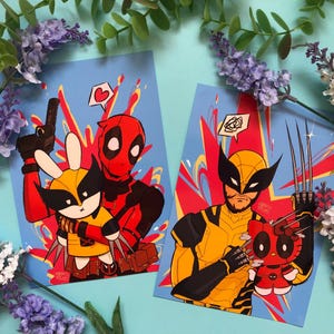 May include: Two colourful illustrations of superhero characters. The first illustration features Deadpool holding a bunny version of Wolverine. The second illustration features Wolverine holding a bunny version of Deadpool. Both illustrations have a red, yellow and blue colour scheme.