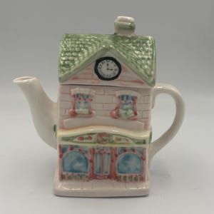 Clock tower Cottage Tea Pot House