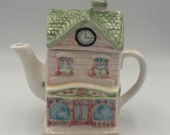 Clock tower Cottage Tea Pot House