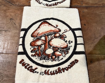 Handdoek en washandje met wilde paddestoelen