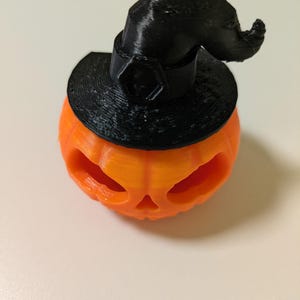 Zucca di Halloween Jack O Lantern con cappello da strega dimensioni Piccole (L 5,8 cm x H 6,5 cm) con led.
