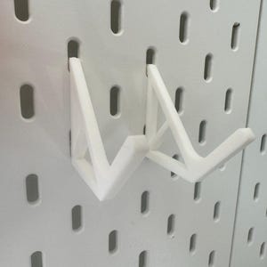 Krokar till spelkontroll: Universell passform för IKEA SKADIS Pegboard bild 8