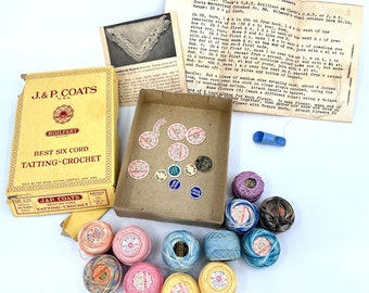 May include: A box of J&P Coats Best Six Cord Tatting-Crochet thread with a variety of colors, including pink, yellow, blue, and white. The box is labeled with the company's name and logo. There are also several small, round, colorful labels with the company's name and logo.
