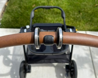StrollerRoller: Easily roll your Nuna Triv Next & LX stroller in and out of your trunk and protect the handle! For Nuna Triv Next or LX only