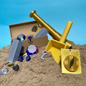 May include: A treasure chest filled with colorful gems, a golden telescope, a compass, and a key. The chest is surrounded by sand.
