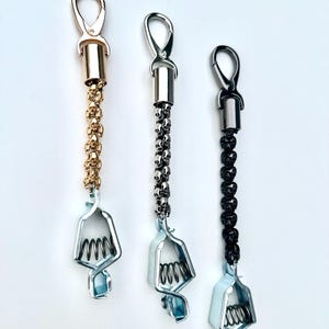 skull chained glove clips