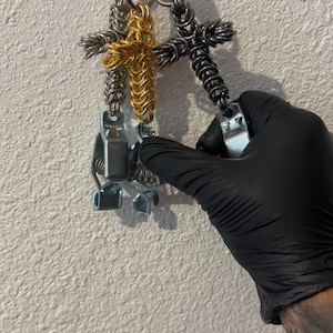 Cross glove clip