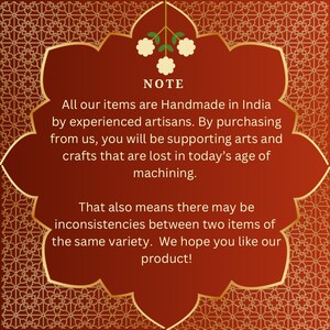 May include: A decorative, ornate, burgundy-colored card with gold trim and a floral design. The text reads "NOTE" and states that items are handmade in India by experienced artisans, supporting lost arts and crafts.