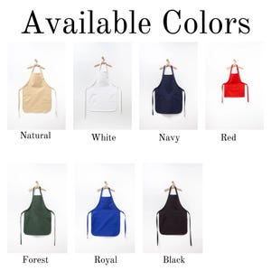 May include: An image displays aprons in various colors: natural, white, navy, red, forest green, royal blue, and black. Each apron hangs on a wooden hanger against a white background. The text "Available Colors" is at the top.